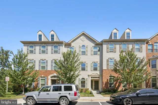 a view of a car parked in front of a building