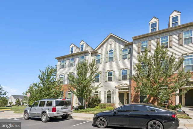 a car parked in front of a house