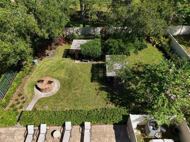 an aerial view of a house having yard