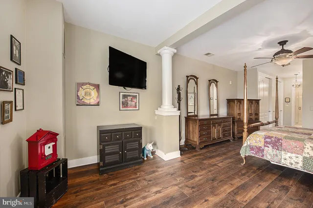 a view of living room with furniture and flat screen tv