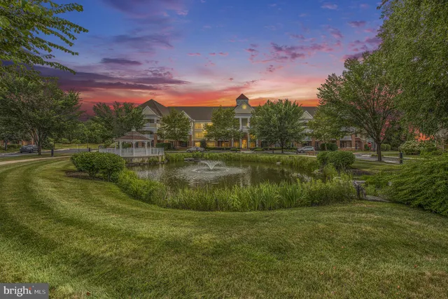 a view of house with yard