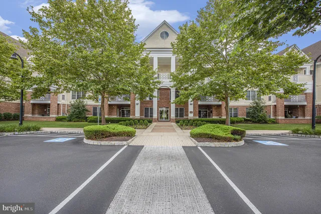 a view of a lake with a building in the background