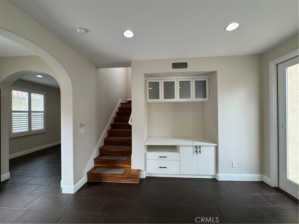 85 Canyoncrest Irvine, CA 92603 - Photo 5 of 12 wooden floor in an empty room with a window and wooden floor