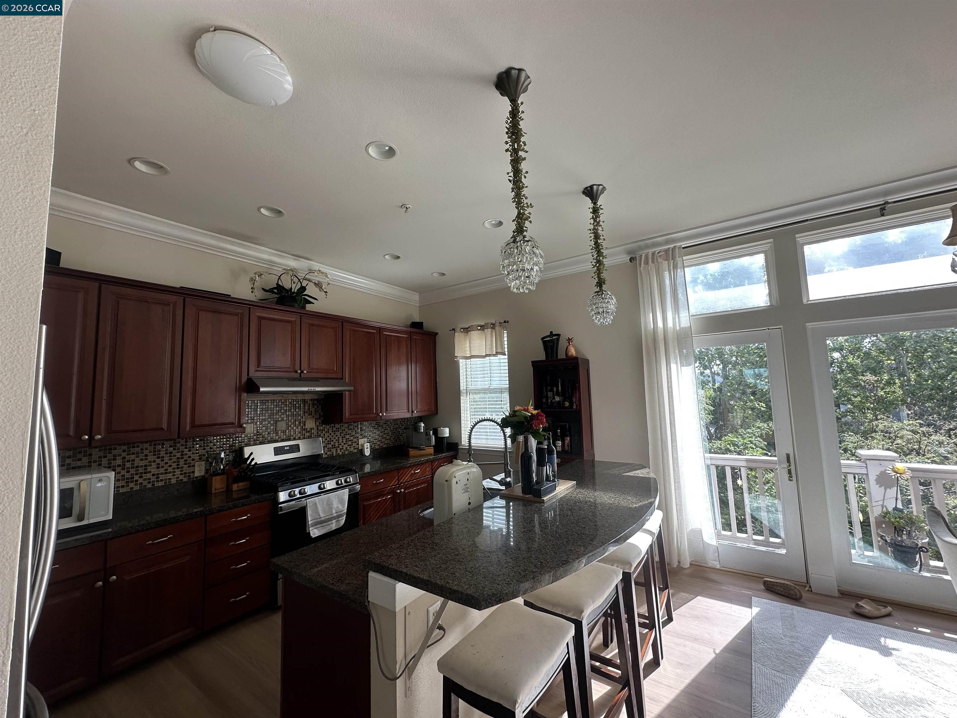 2144 Railroad Avenue Hercules, CA 94547 - Photo 19 of 29 a kitchen with sink a window and appliances