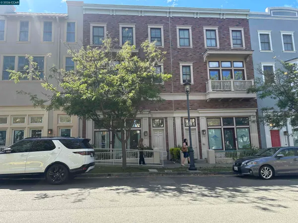 a view of a car parked in front of a building