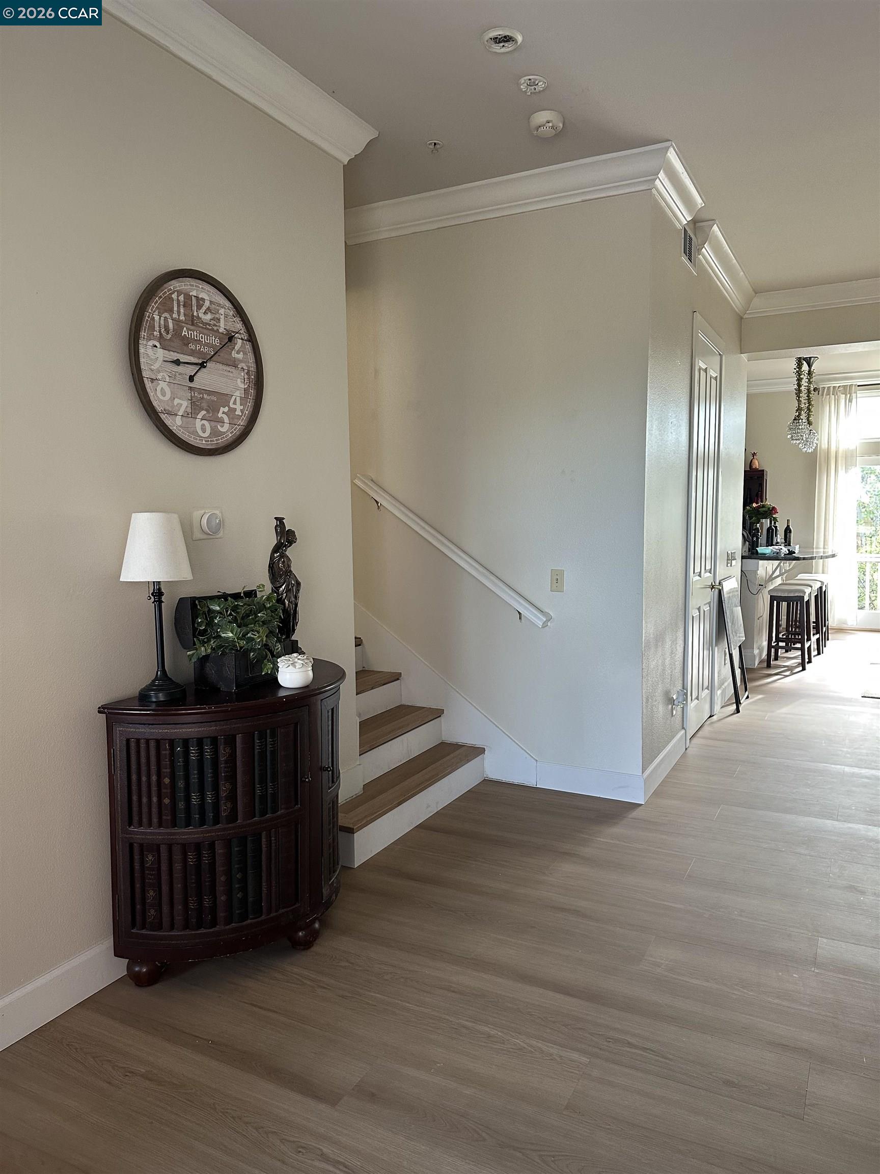 2144 Railroad Avenue Hercules, CA 94547 - Photo 23 of 29 a view of a hallway with entryway wooden floor and front door