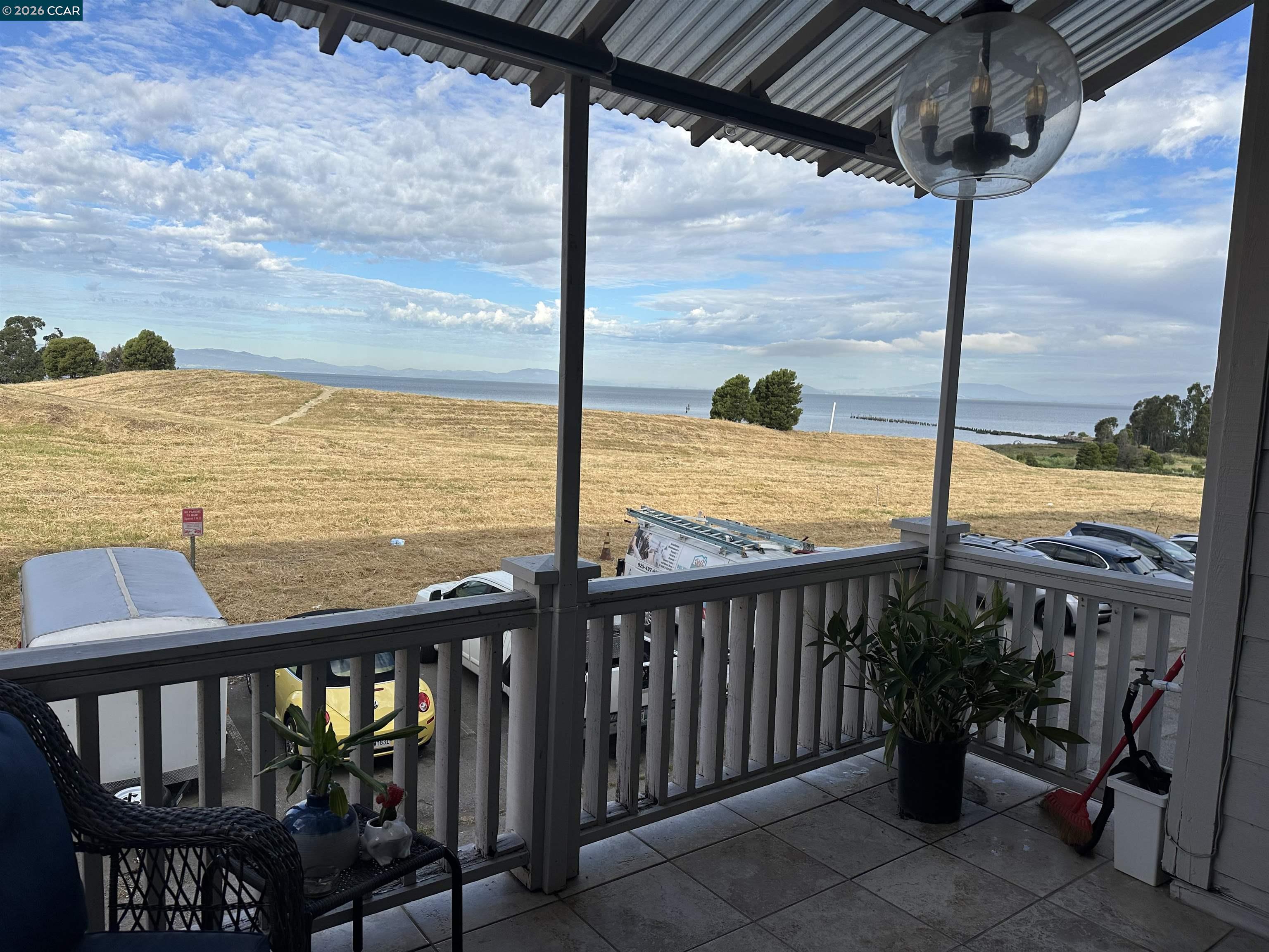 2144 Railroad Avenue Hercules, CA 94547 - Photo 26 of 29 a view of a balcony with chair and floor to ceiling window