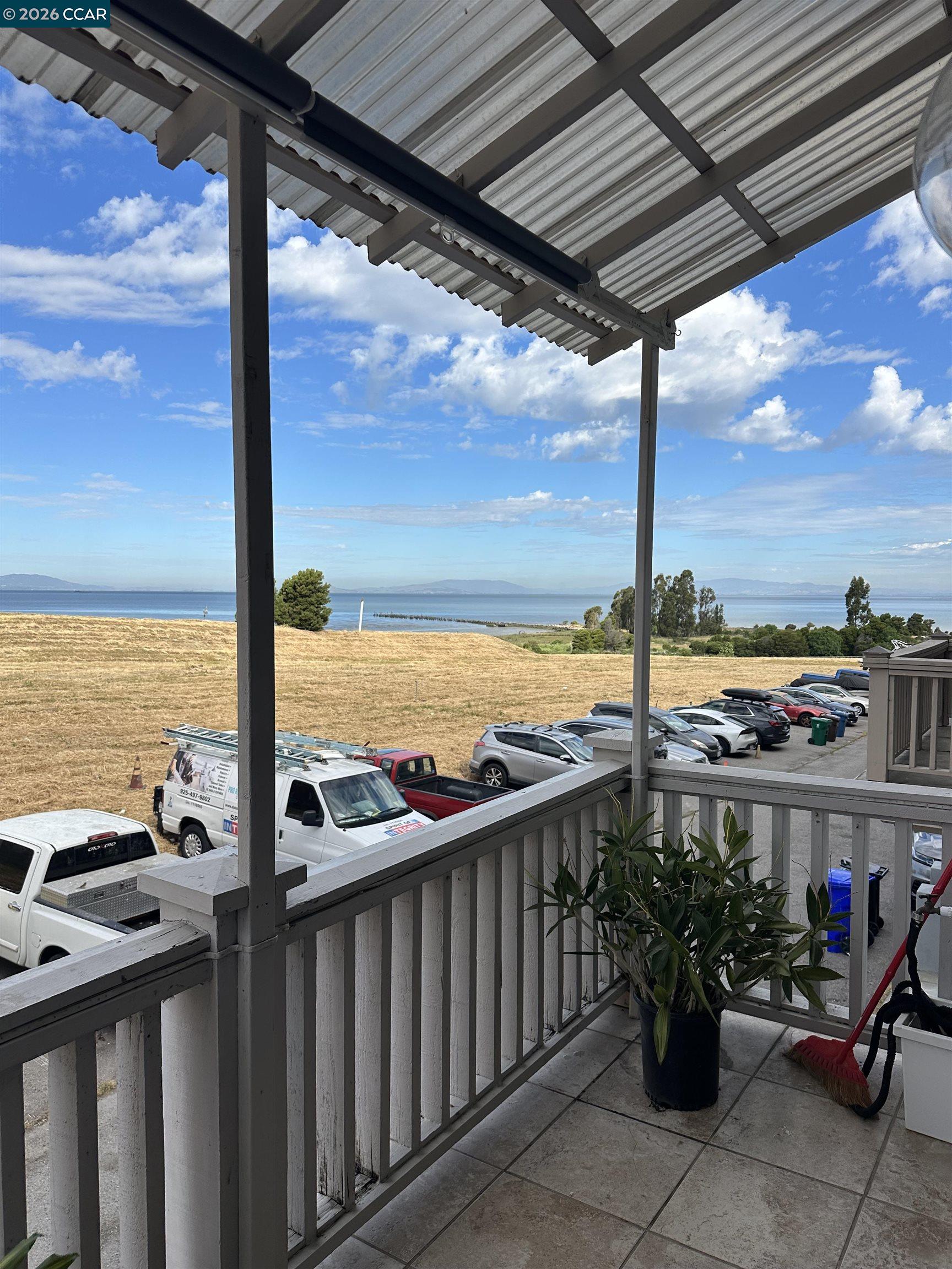 2144 Railroad Avenue Hercules, CA 94547 - Photo 28 of 29 a view of a balcony with chairs and ocean view