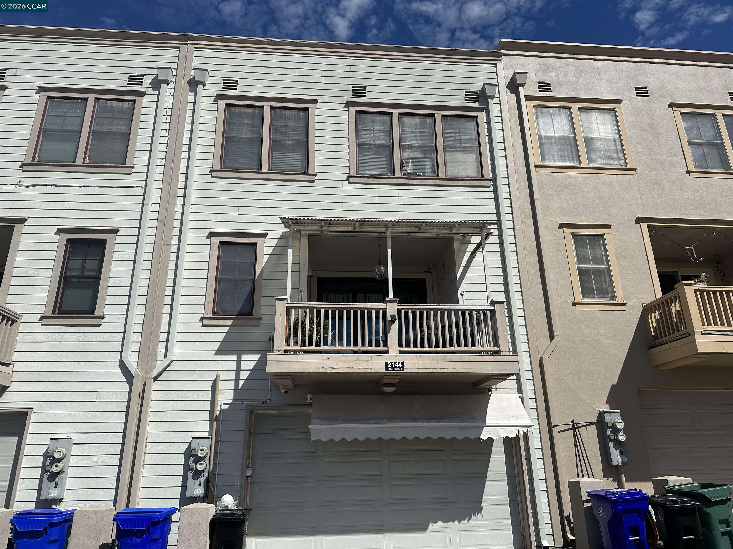 2144 Railroad Avenue Hercules, CA 94547 - Photo 5 of 29 a front view of a house with a balcony