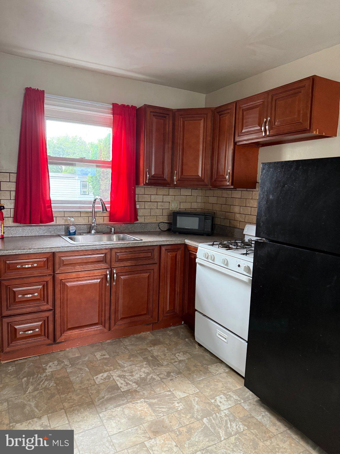 2807 Kutztown Road Reading, PA 19605 - Photo 11 of 11 Cozy kitchen with warm wooden tones.