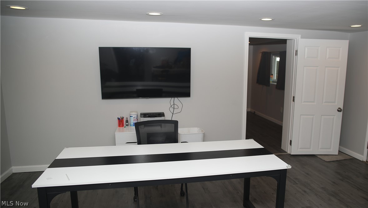 1087 Krumroy Road Akron, OH 44306 - Photo 19 of 23 Recessed lighting, wood-finish flooring, and a paneled interior door