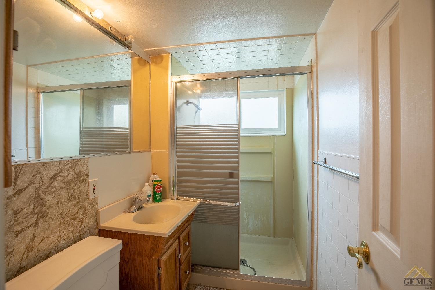 Undisclosed Address Taft, CA 93268 - Photo 13 of 24 a bathroom with a sink and a mirror