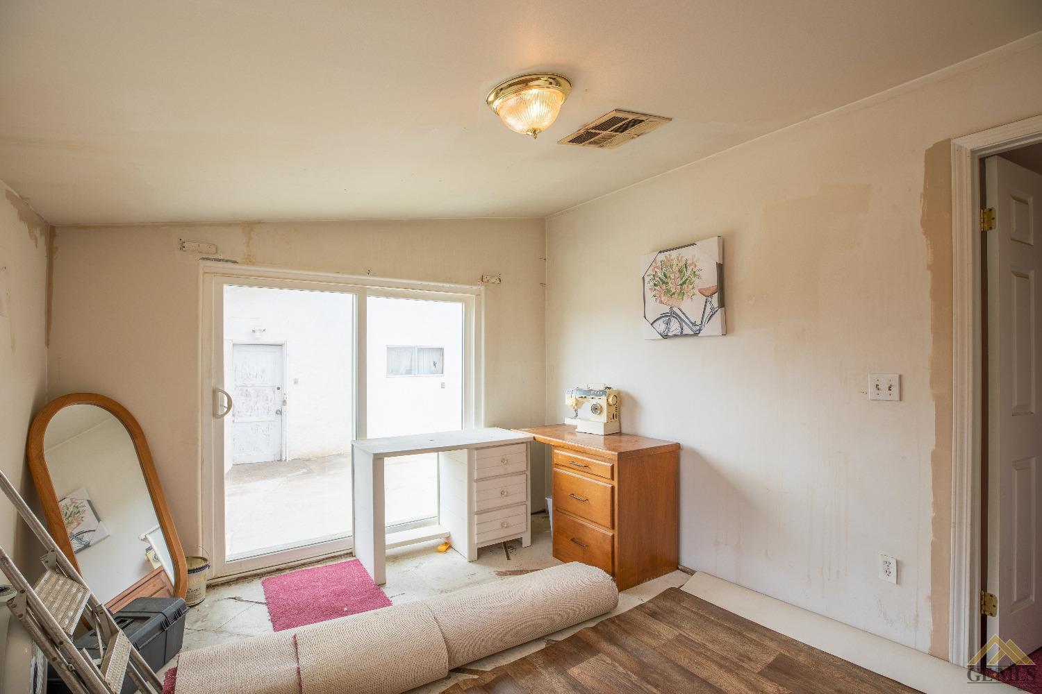 Undisclosed Address Taft, CA 93268 - Photo 14 of 24 a living room with furniture and a window