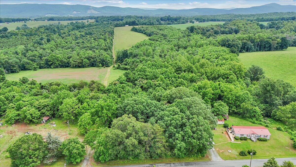 0 Beulah Road Rocky Mount, VA 24151 - Photo 7 of 37 an aerial view of residential house with outdoor space and trees all around