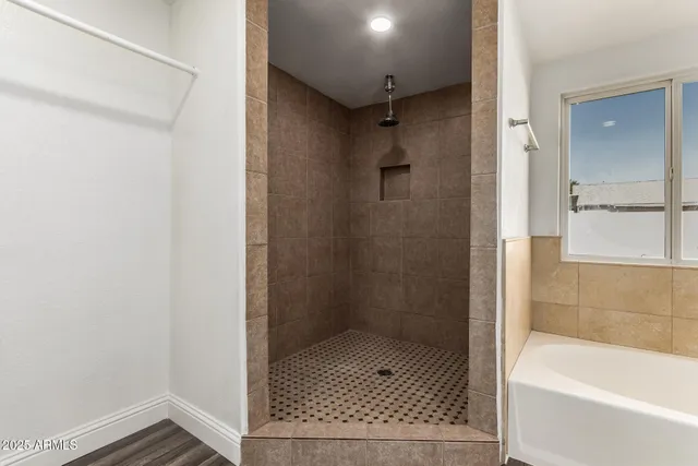 a bathroom with a sink and cabinets