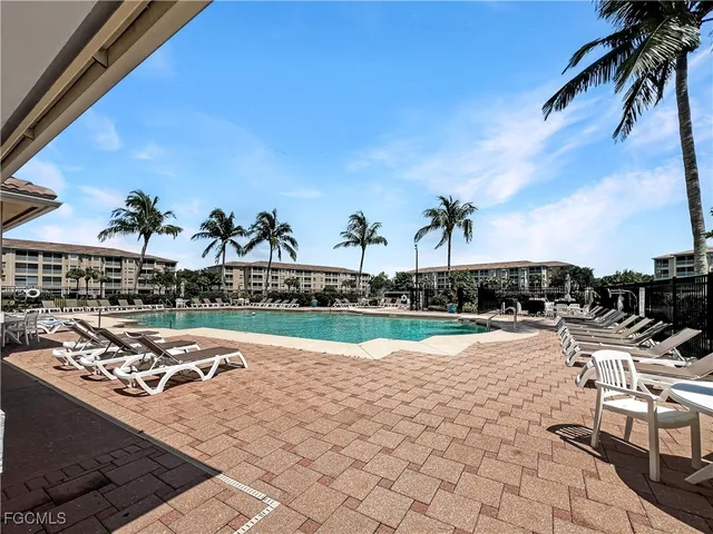 a view of living room filled with furniture and rug