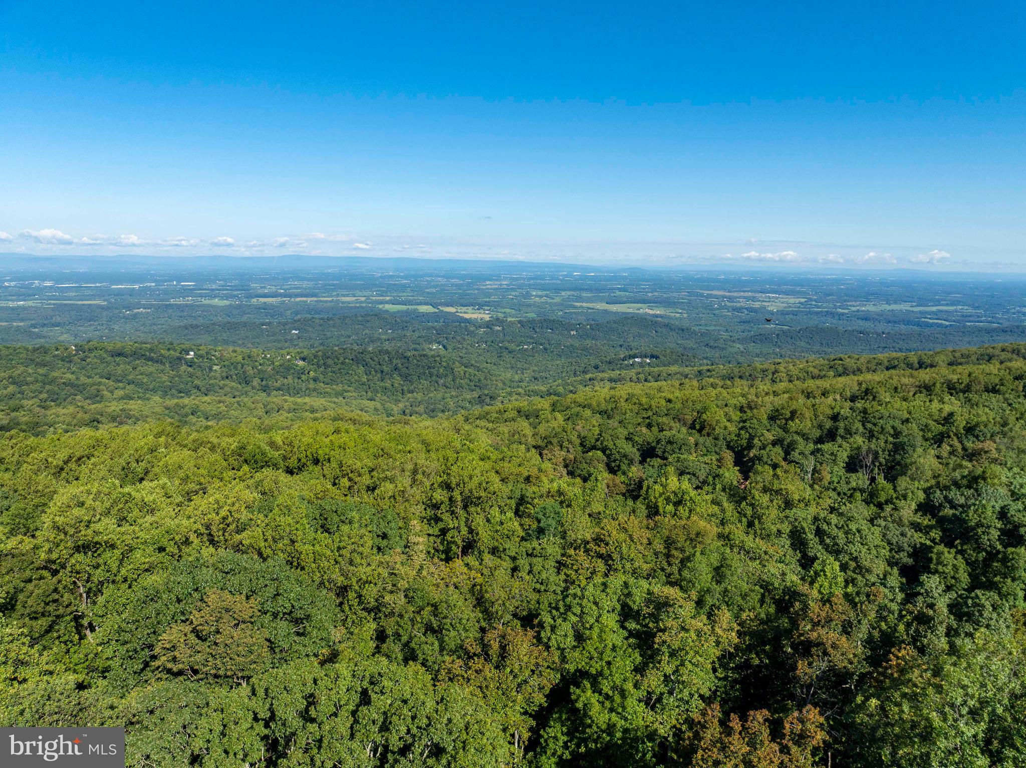 4871 Blue Mountain Road Linden, VA 22642 - Photo 2 of 73 a view of an ocean and mountain