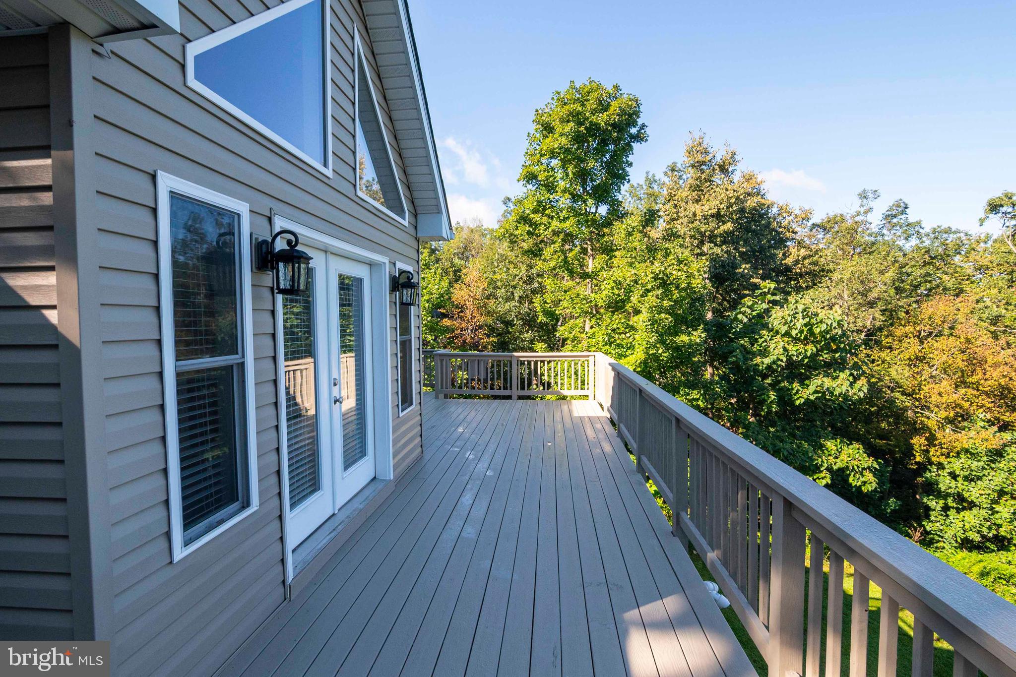 4871 Blue Mountain Road Linden, VA 22642 - Photo 21 of 73 a view of balcony with wooden floor