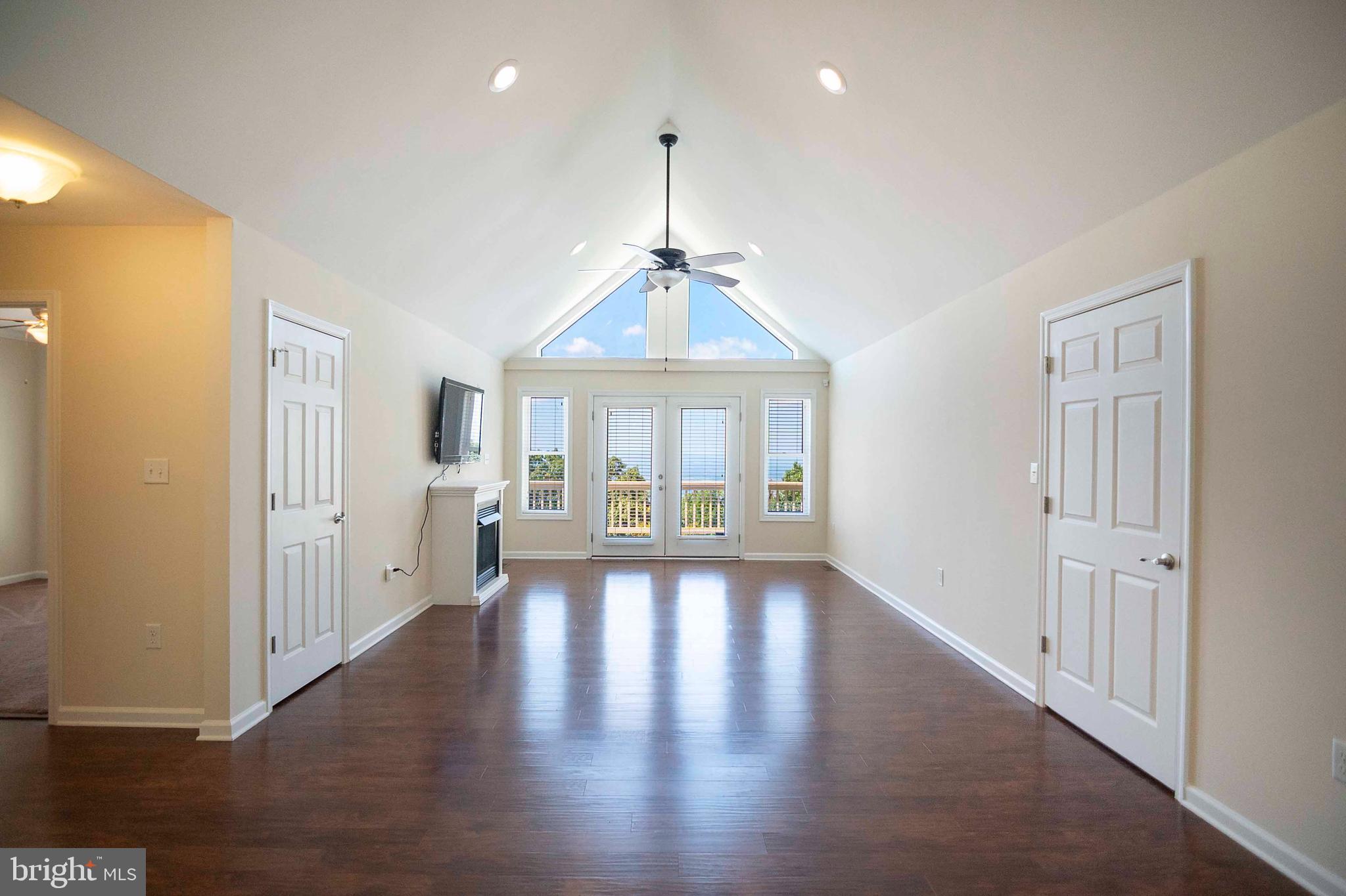 4871 Blue Mountain Road Linden, VA 22642 - Photo 32 of 73 a view of an empty room with wooden floor and a window