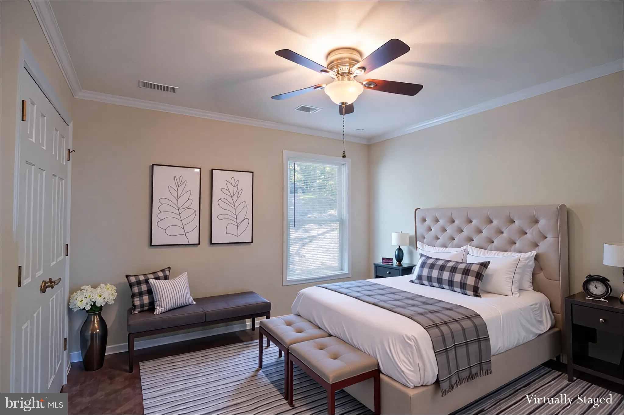 4871 Blue Mountain Road Linden, VA 22642 - Photo 40 of 73 a bedroom with a bed and a chandelier