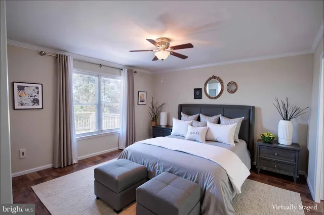 a spacious bedroom with a large bed and a window