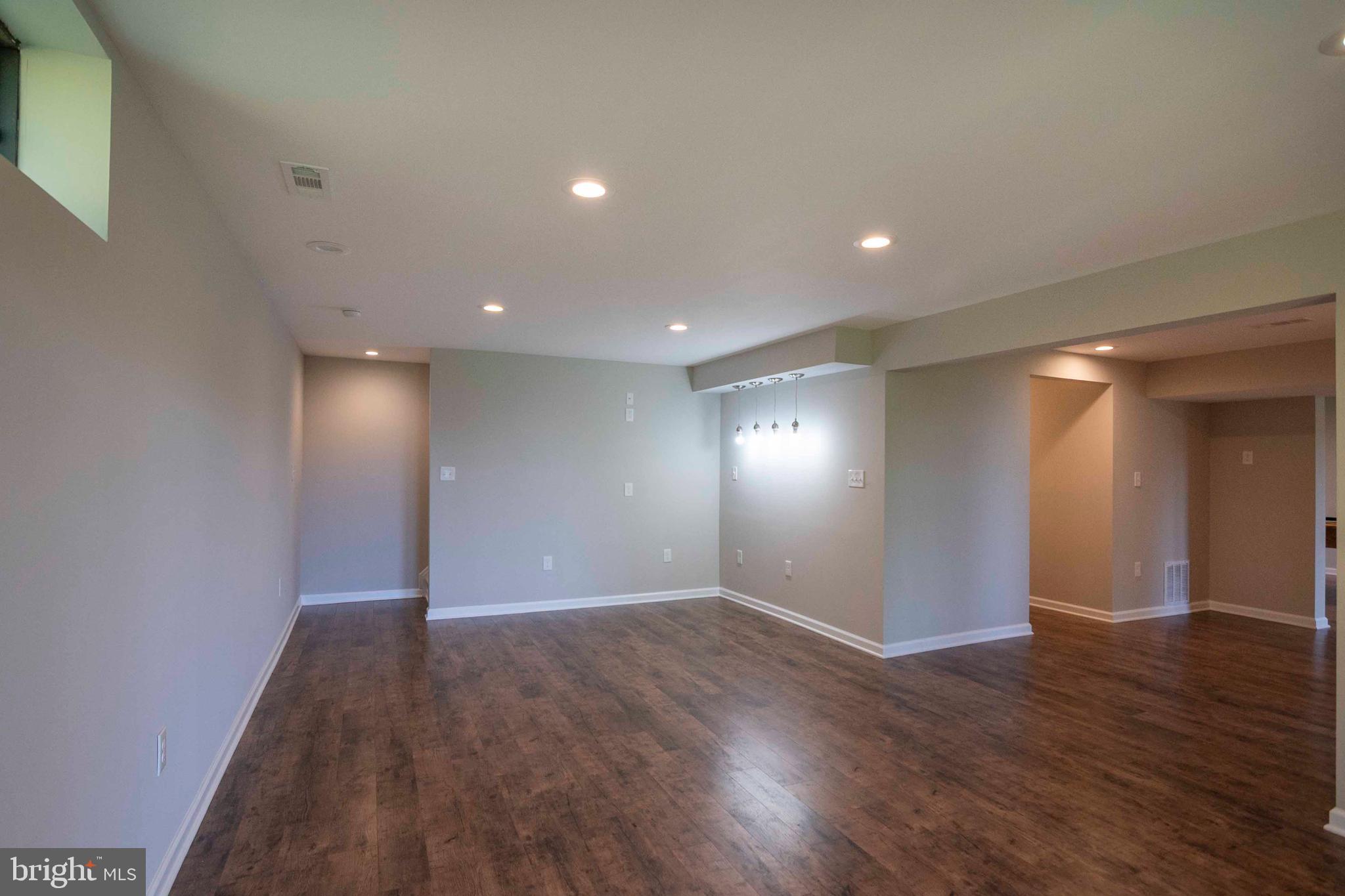 4871 Blue Mountain Road Linden, VA 22642 - Photo 50 of 73 a view of an empty room with wooden floor