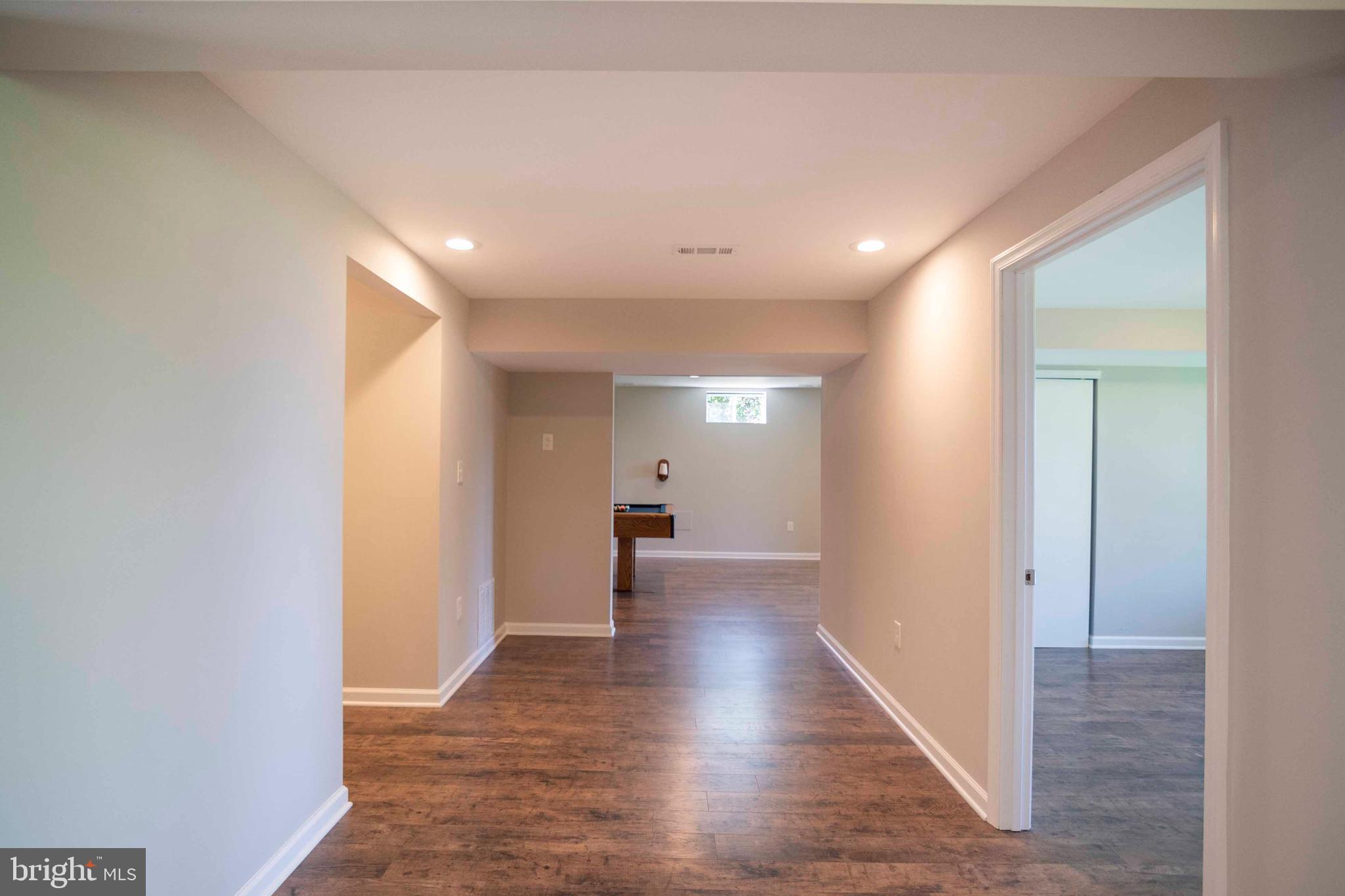 4871 Blue Mountain Road Linden, VA 22642 - Photo 51 of 73 a view of a hallway with wooden floor