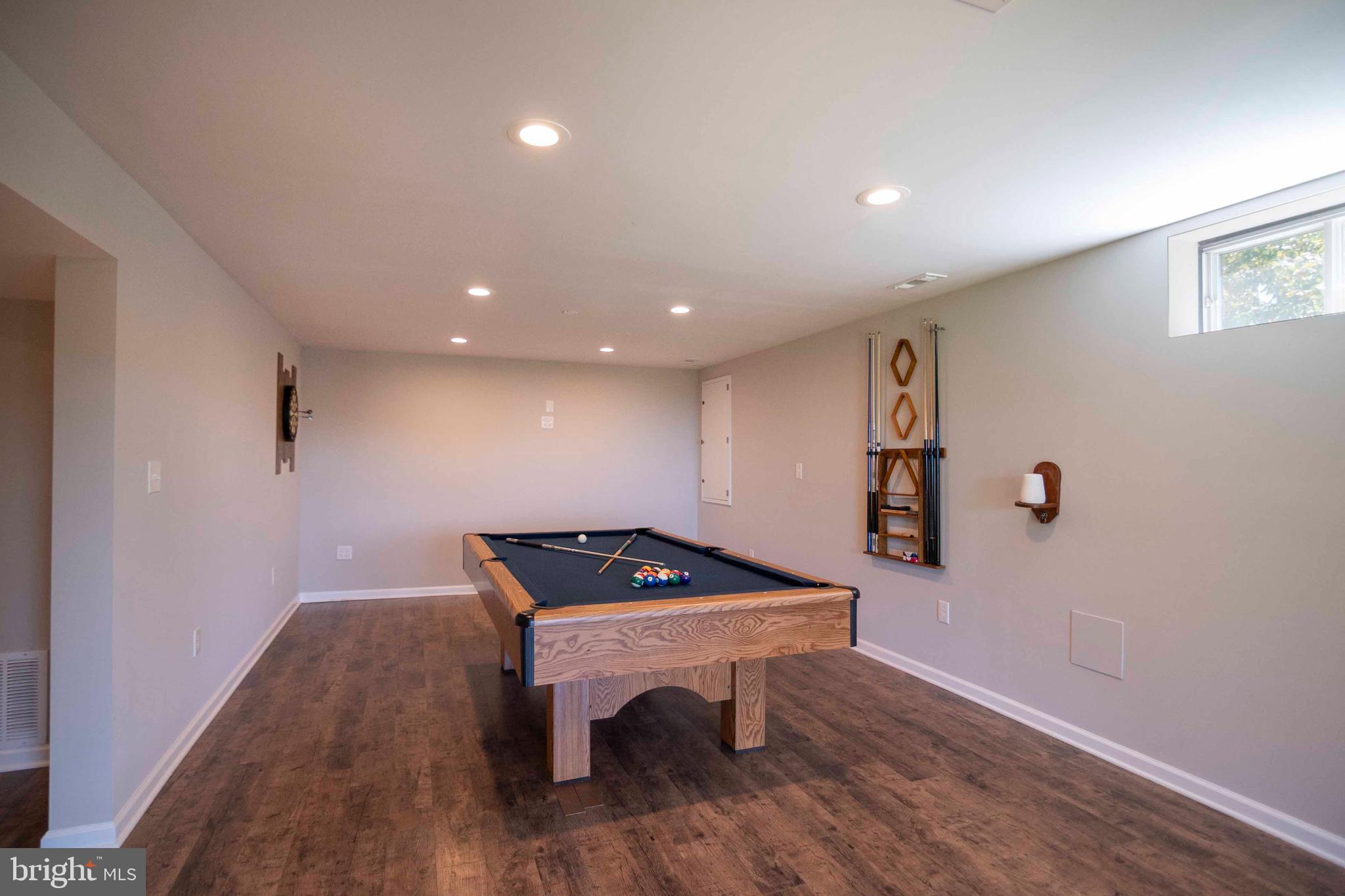 4871 Blue Mountain Road Linden, VA 22642 - Photo 53 of 73 a view of a room with furniture and wooden floor