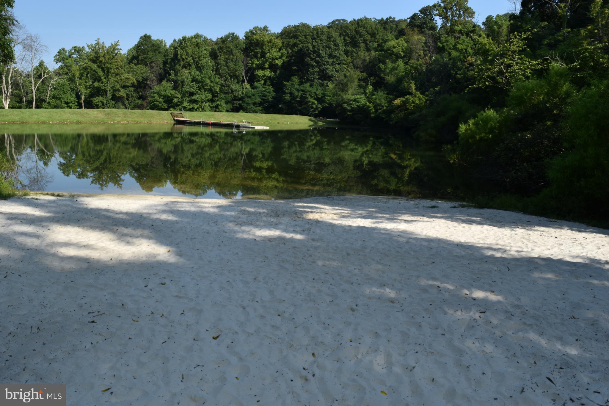4871 Blue Mountain Road Linden, VA 22642 - Photo 67 of 73 a view of a lake with a yard