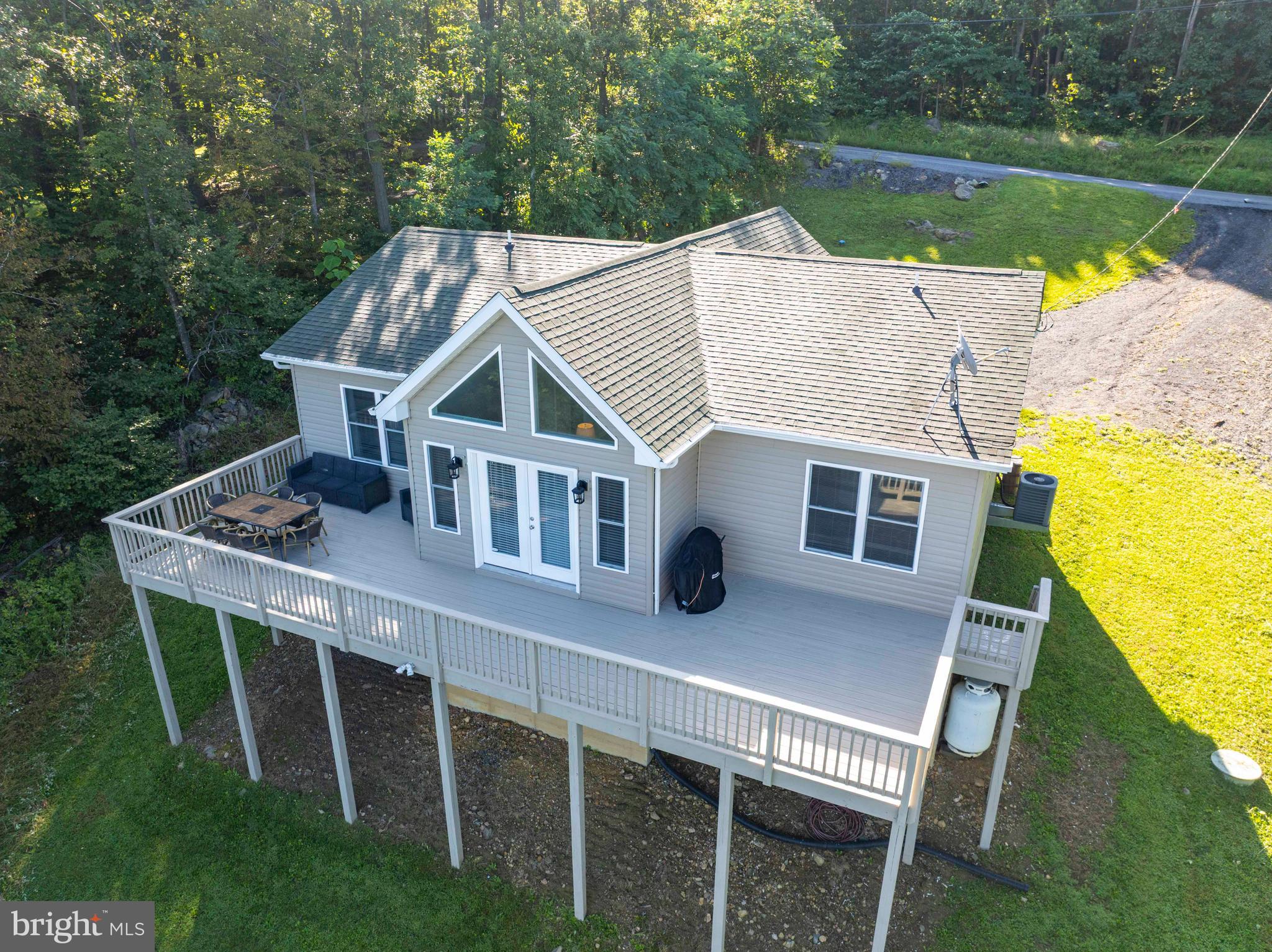4871 Blue Mountain Road Linden, VA 22642 - Photo 9 of 73 a aerial view of a house with pool and a yard