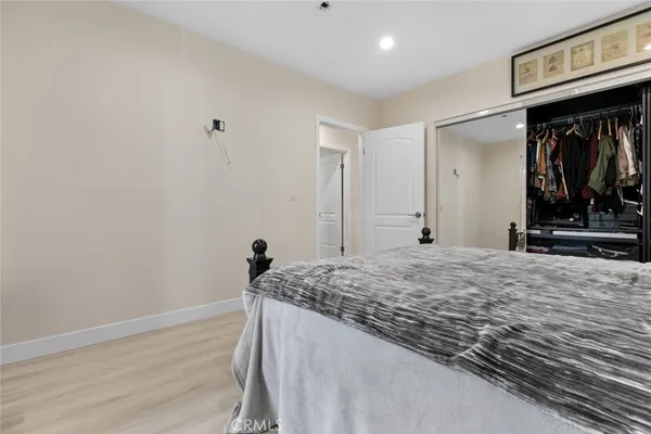 a bathroom with a sink toilet a mirror and shower