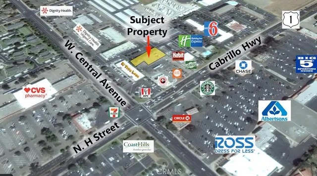 a view of a street with cars