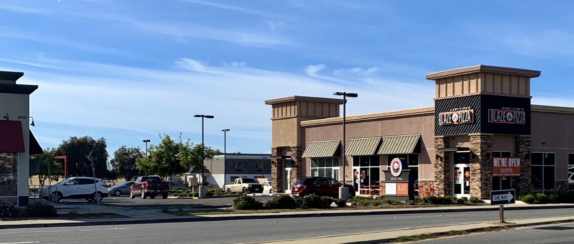 1407 North H Street Lompoc, CA 93436 - Photo 2 of 2 a view of a street with cars