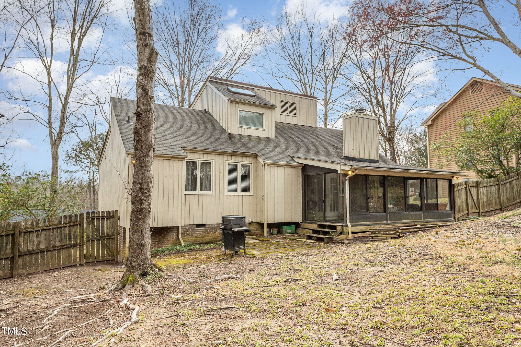 6913 Three Bridges Circle Raleigh, NC 27613 - Photo 27 of 28 a front view of a house with a yard