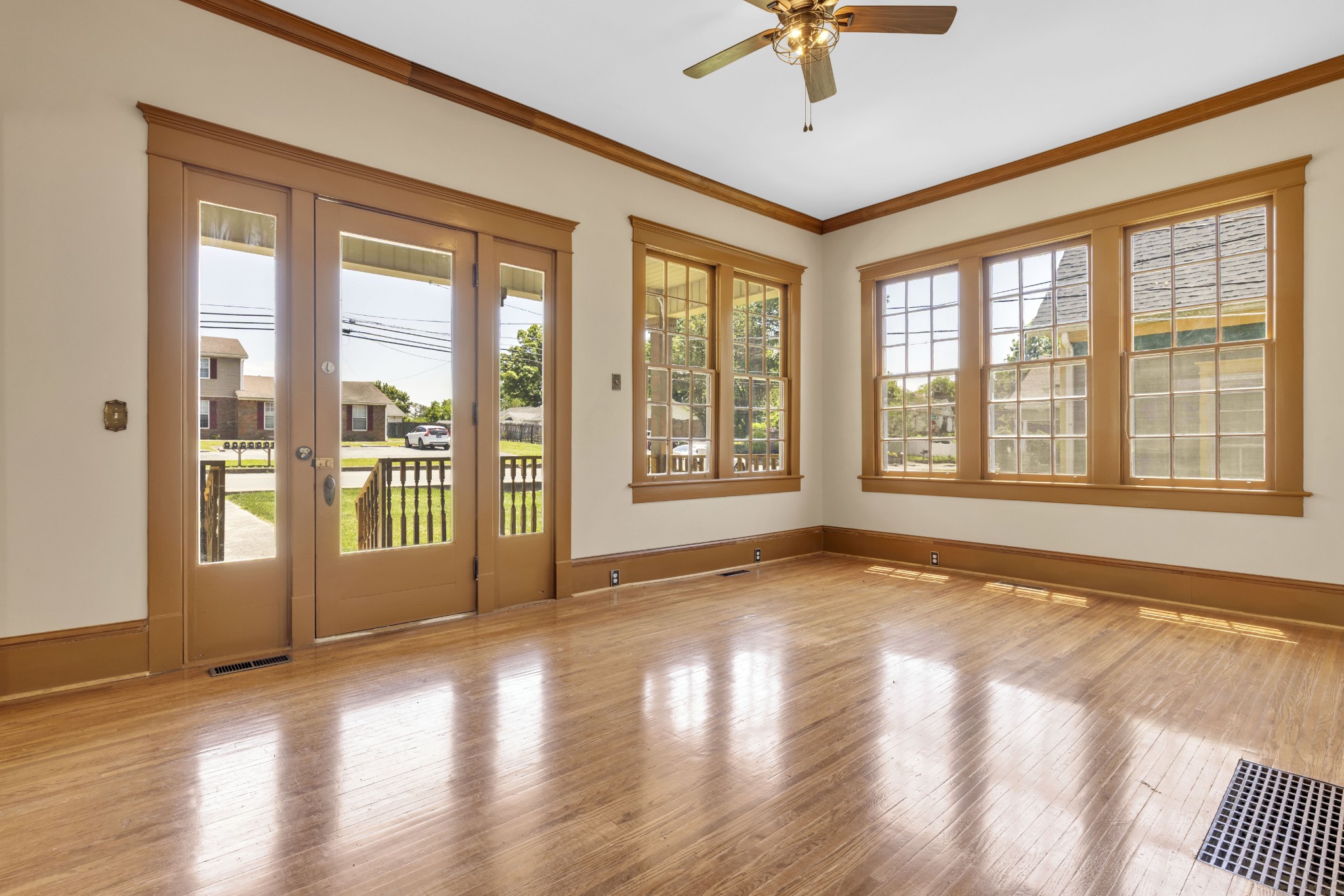 115 North Main Street Springfield, TN 37172 - Photo 11 of 24 a view of an empty room with a window and wooden floor