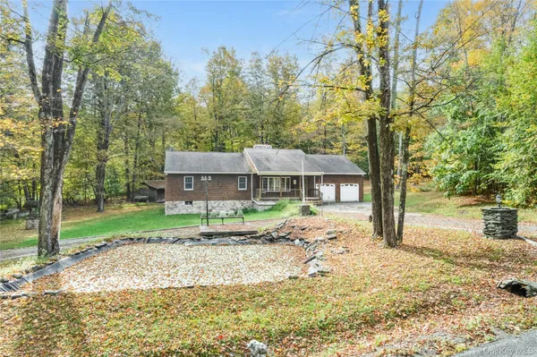 a house with trees in front of it