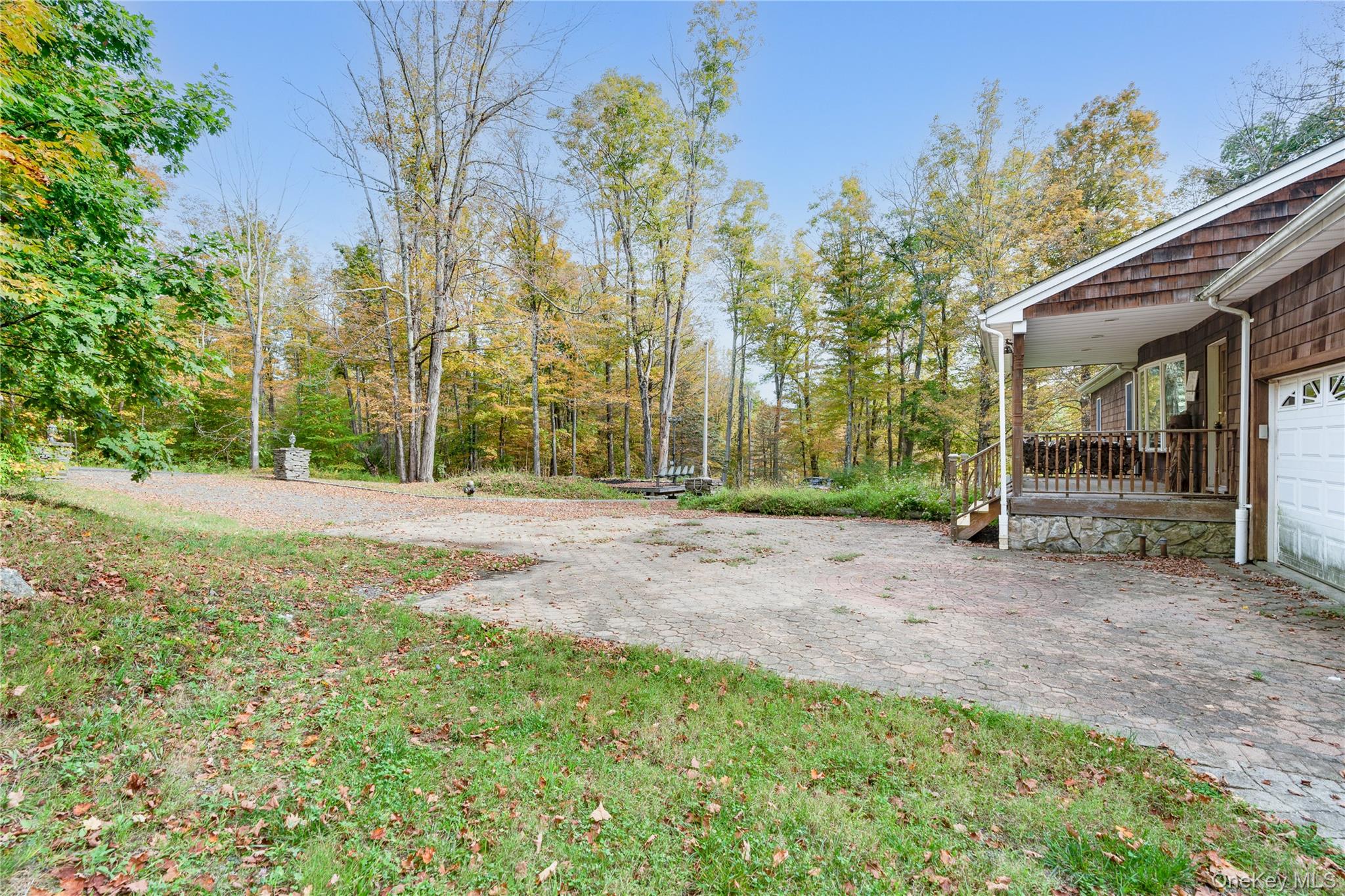 91 Decker Road Ancram, NY 12502 - Photo 22 of 35 a view of a backyard with large trees