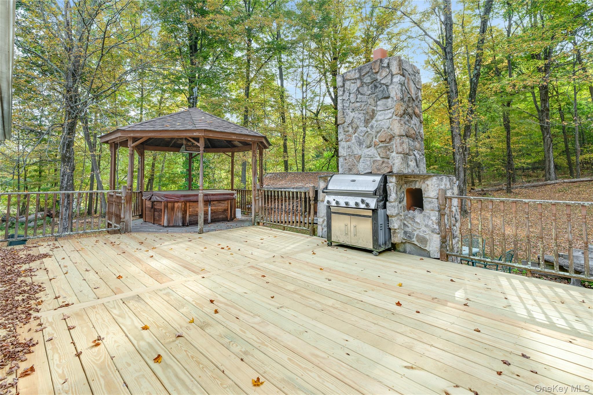 91 Decker Road Ancram, NY 12502 - Photo 26 of 35 a wooden bench sitting in front of a building