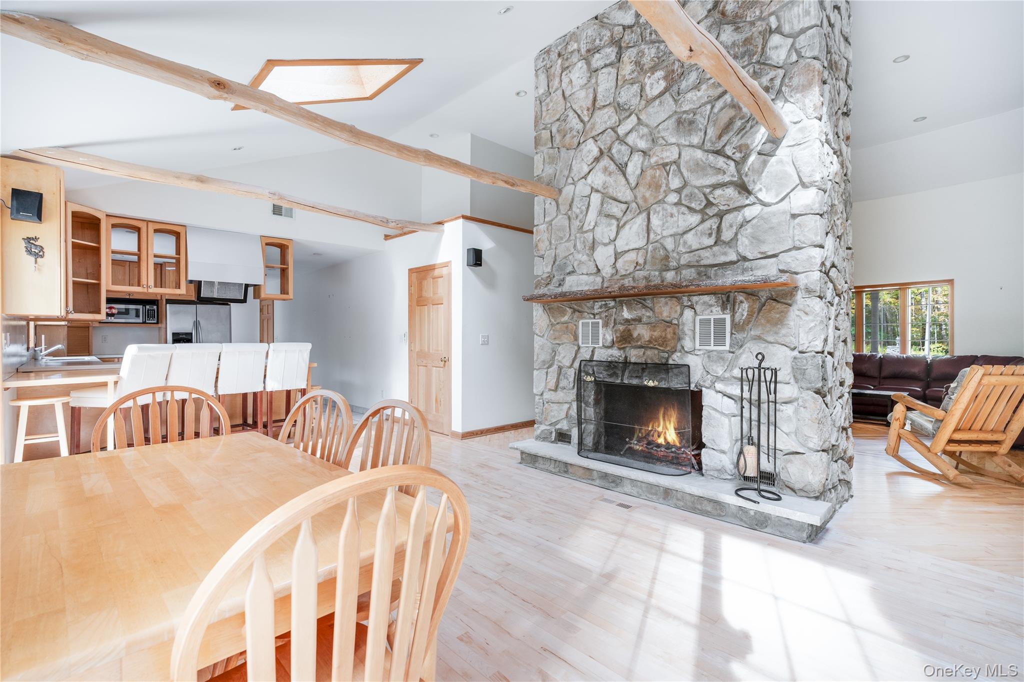 91 Decker Road Ancram, NY 12502 - Photo 6 of 35 a living room with furniture and a fireplace