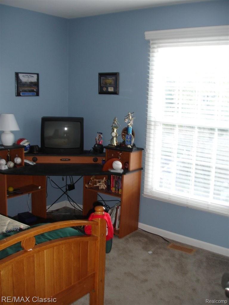 1292 Brook Lane, Unit 292 Rochester, MI 48306 - Photo 9 of 10 BEDROOM 2 VIEW