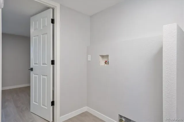 a view of a hallway with entryway