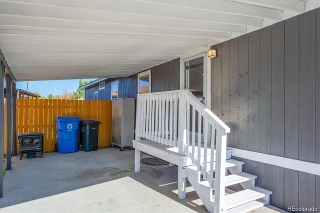 a view of entryway with a house and wooden floor