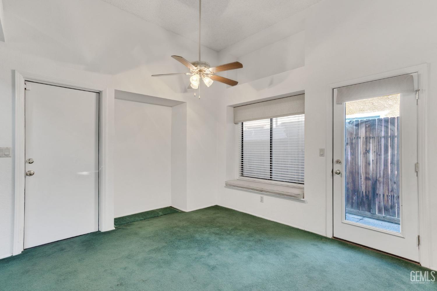 Undisclosed Address Bakersfield, CA 93311 - Photo 12 of 44 a view of an empty room with a window