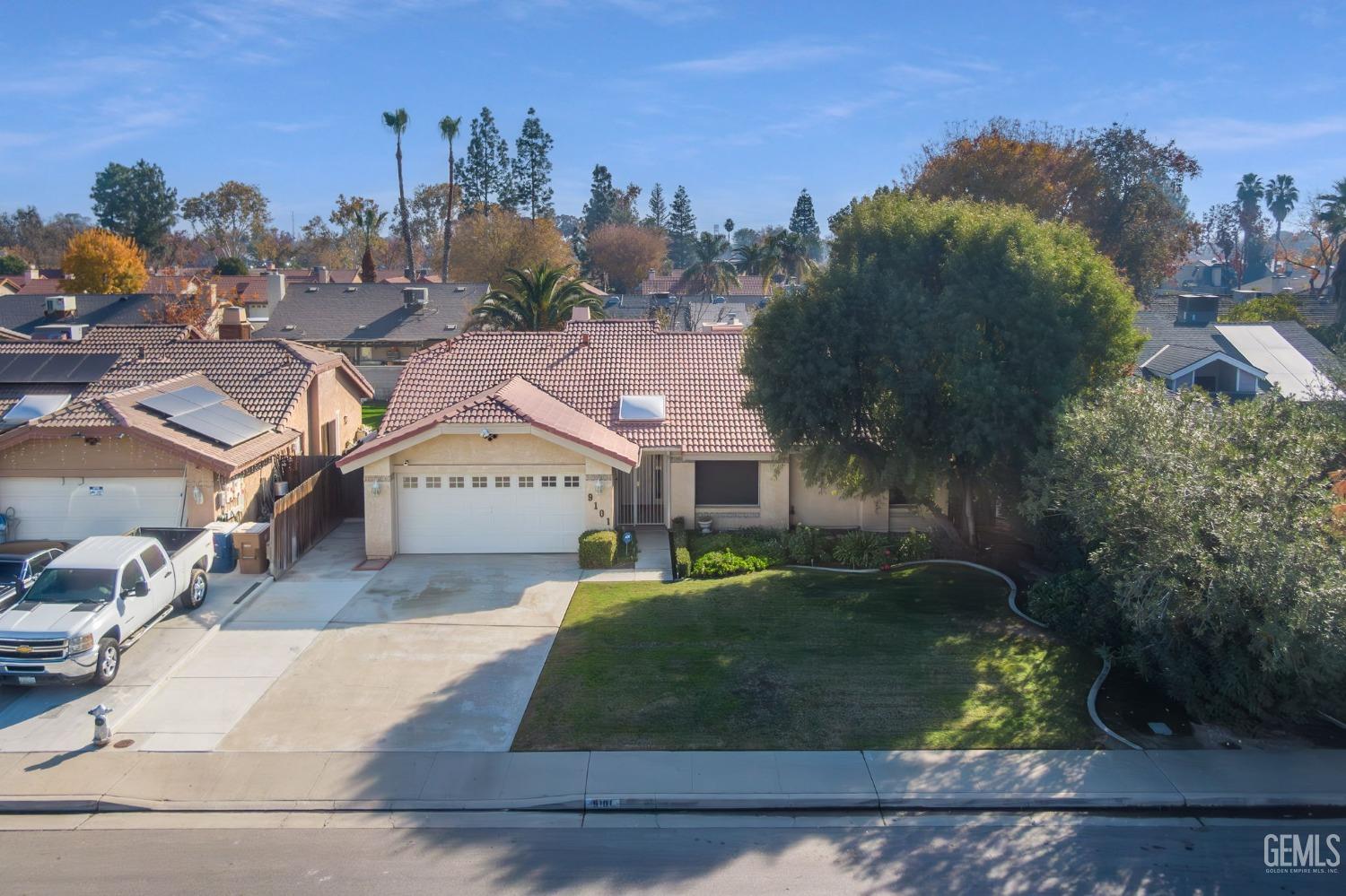Undisclosed Address Bakersfield, CA 93311 - Photo 2 of 44 an aerial view of a house