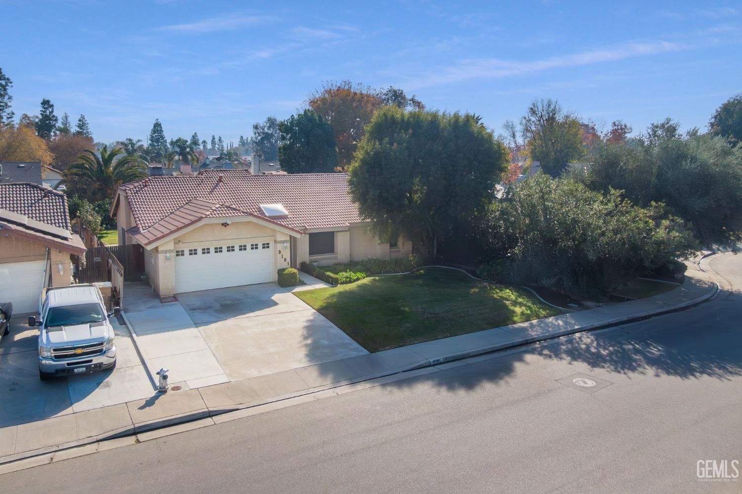 Undisclosed Address Bakersfield, CA 93311 - Photo 3 of 44 a view of a street with a building in the background