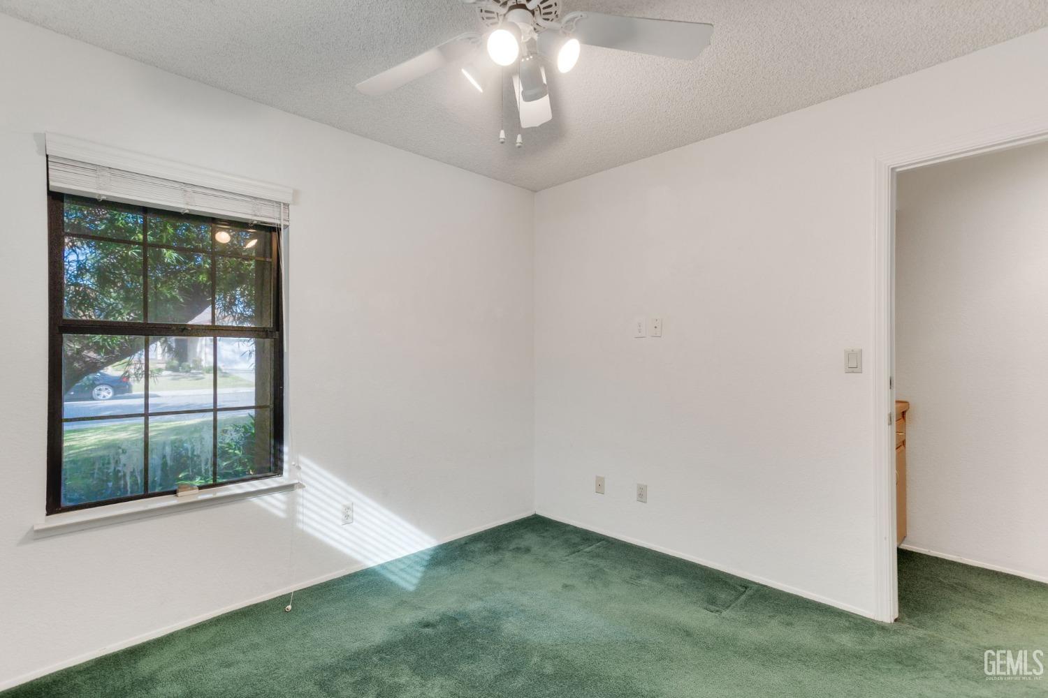 Undisclosed Address Bakersfield, CA 93311 - Photo 34 of 44 an empty room with a window