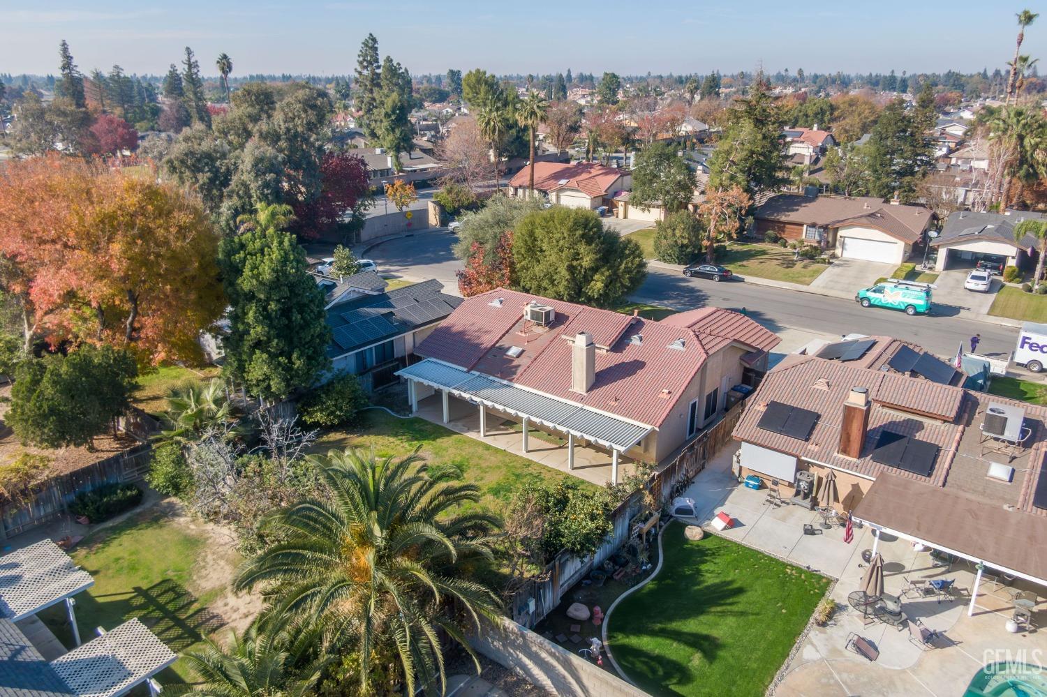Undisclosed Address Bakersfield, CA 93311 - Photo 40 of 44 an aerial view of multiple houses with yard