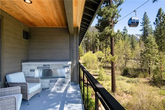 a balcony view with chairs