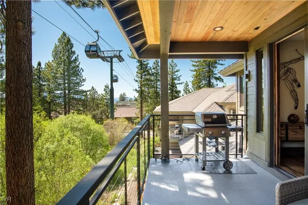 a view of balcony with furniture