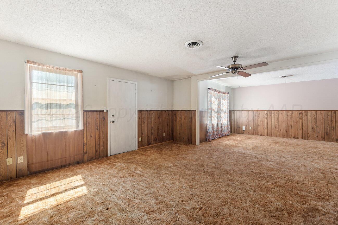 4305 South Bonham Street Amarillo, TX 79110 - Photo 16 of 48 a view of an empty room with a window